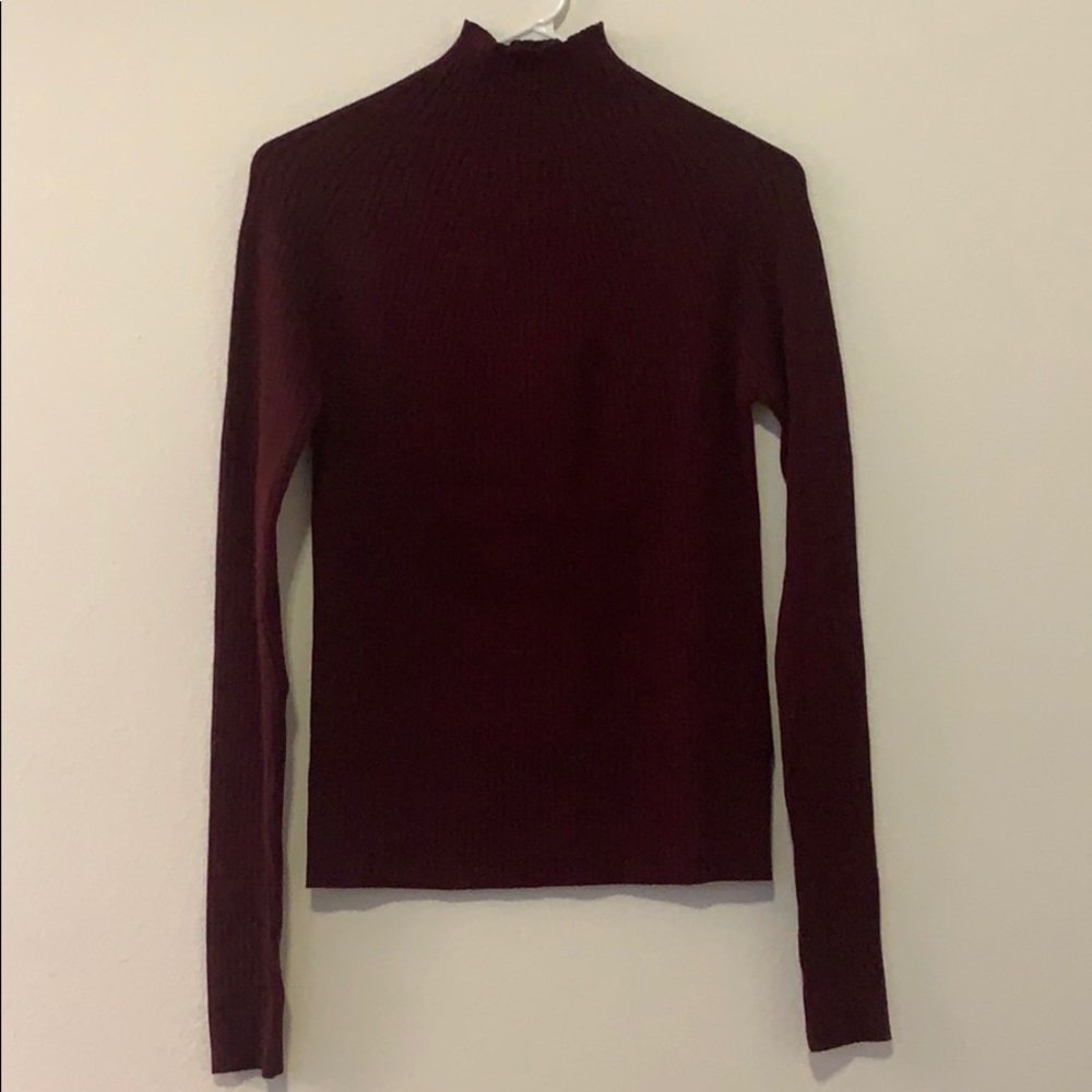 Form fitting long sleeve sweater